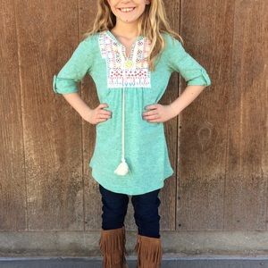 NWOT. Girls embroidered front top with tasssles